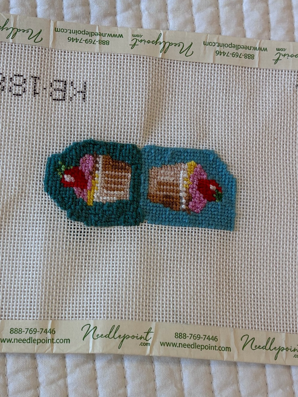 Completed Kirk & Bradley needlepoint scissor finder canvas